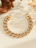 Full diamond heavy metal rap bracelet in gold with chunky link construction and diamond cut surface.