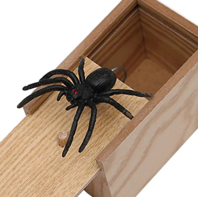 Wooden prank scare box with jumping spider surprise for April Fools jokes