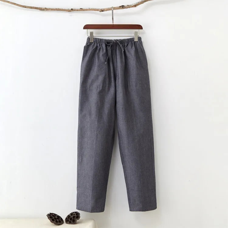 Men's beige pure cotton casual trousers with a drawstring waist on a mid-rise fit.