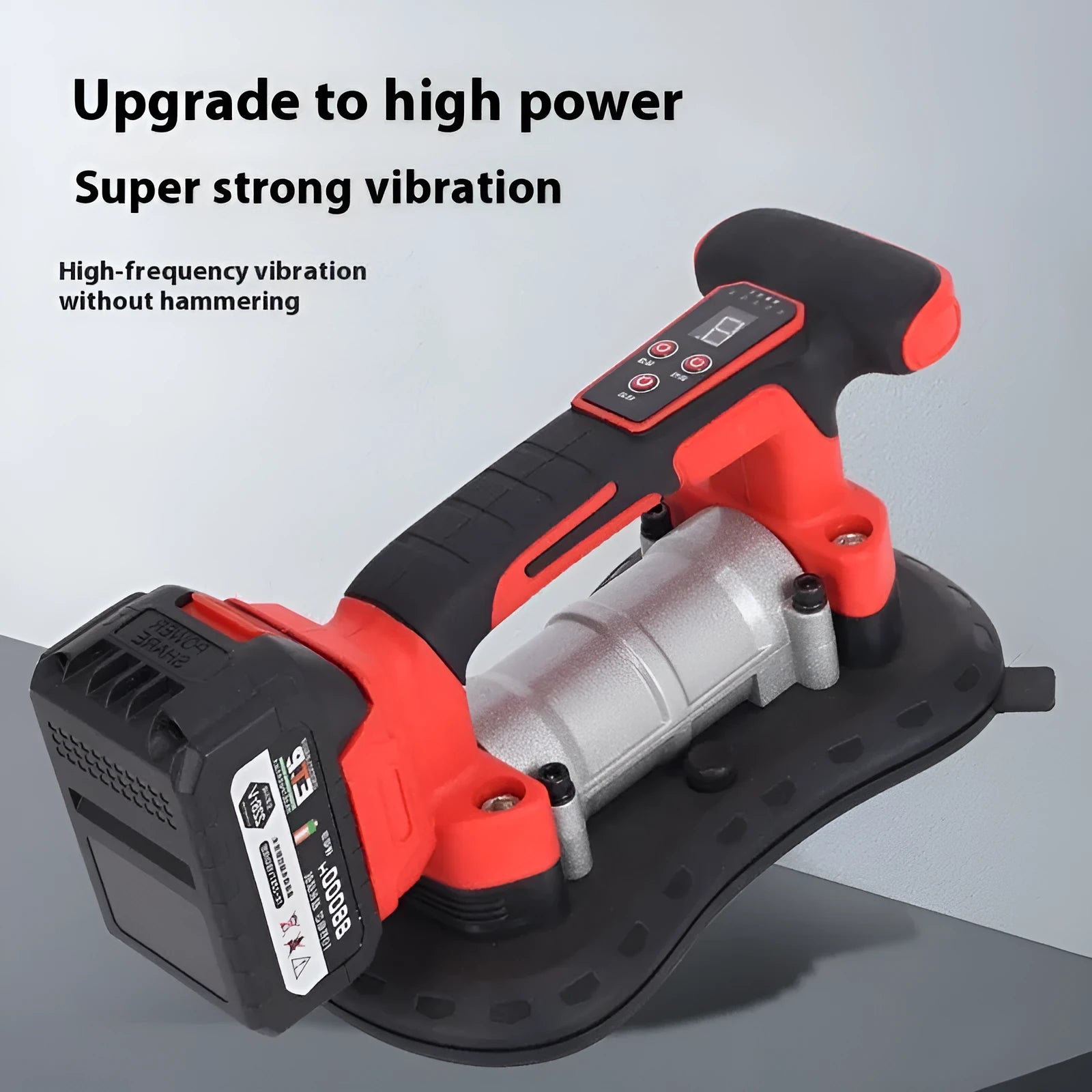 Cordless tile laying machine with battery, shown handling a large format tile