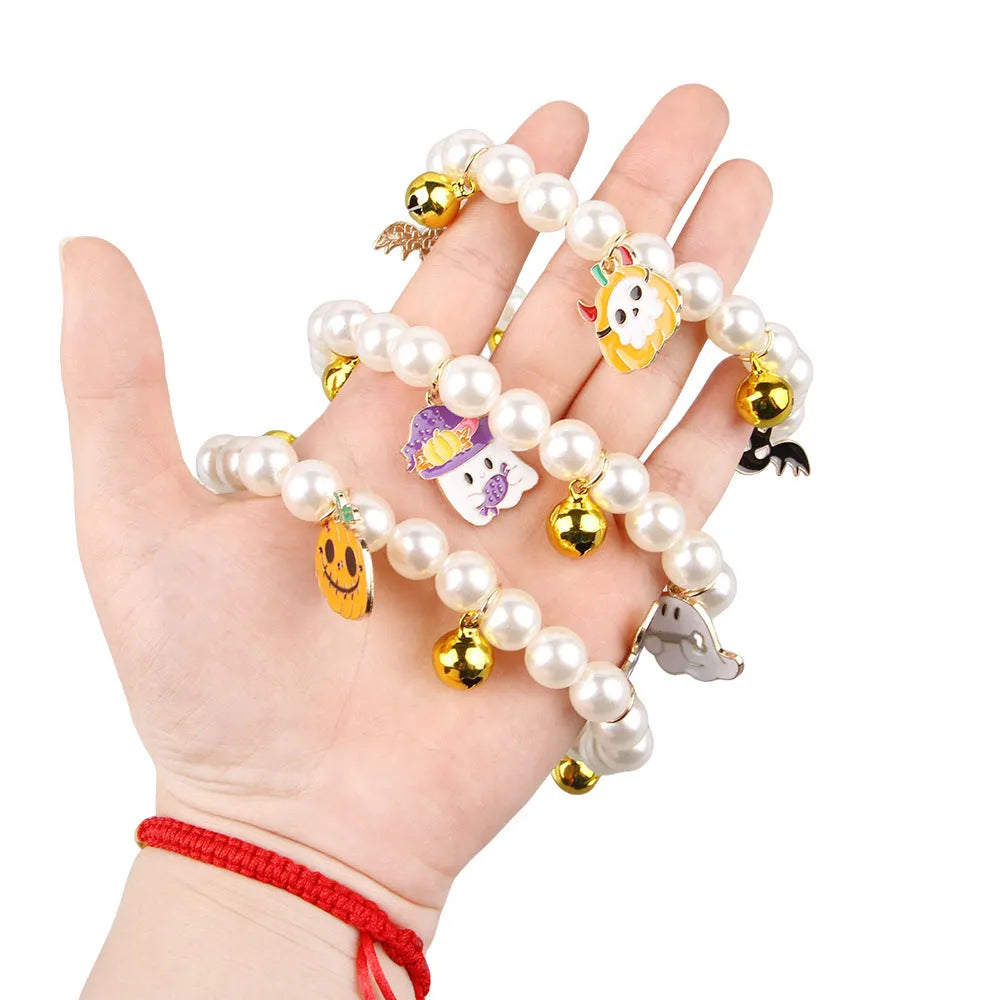 Halloween cat collar with simulated pearl beads and purple pumpkin charm decoration