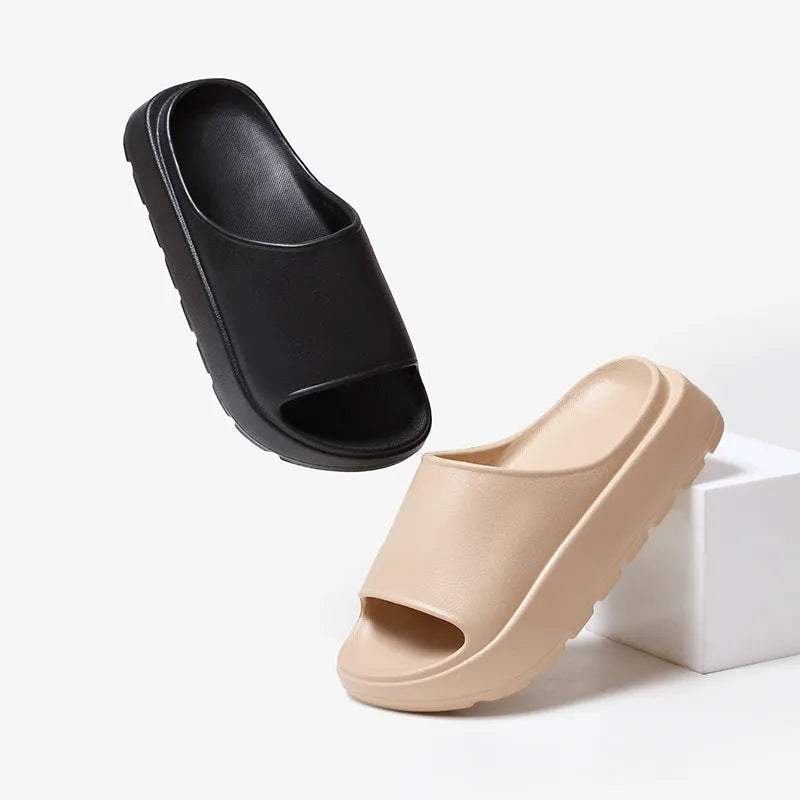 Women's beige fish mouth design beach slippers with a thick 5.5cm EVA sole.