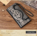 Retro brown embossed floral pattern tri-fold women's wallet made from genuine cowhide, shown open.