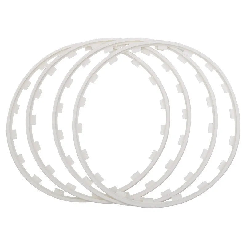 Set of four nylon wheel hub protection rings in multiple colours and sizes
