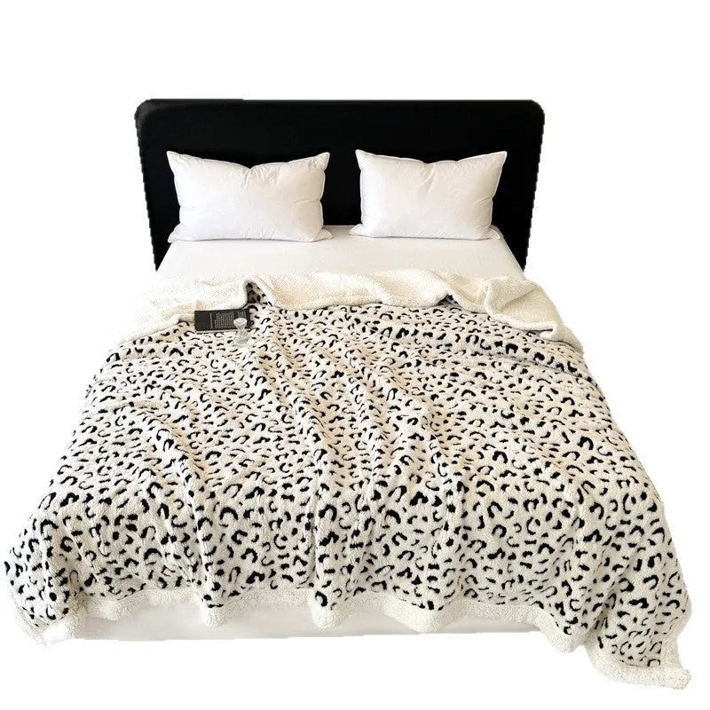 Leopard jacquard pattern taffeta blanket in camel colour with double-layer cationic construction