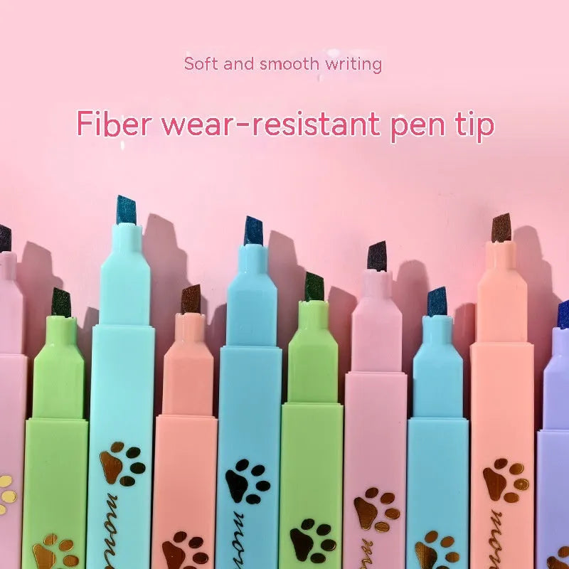 Cat's Paw set of six fluorescent marking pens with oblique heads in assorted colours.