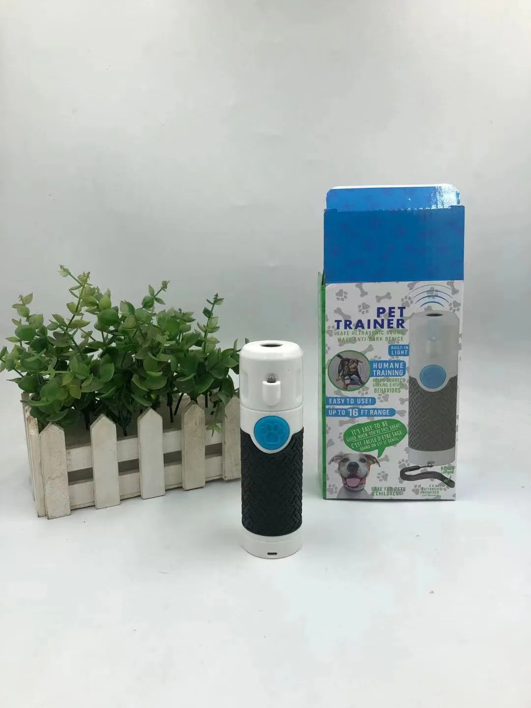 White handheld ultrasonic dog bark stop device with frequency adjustment controls