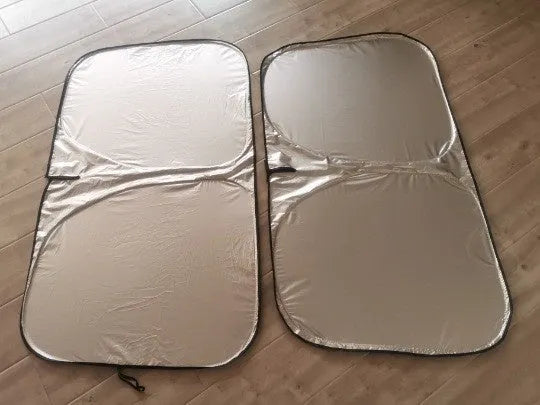 Aluminium foil car sunshade in titanium silver, shown in a rectangular shape for windscreen coverage.
