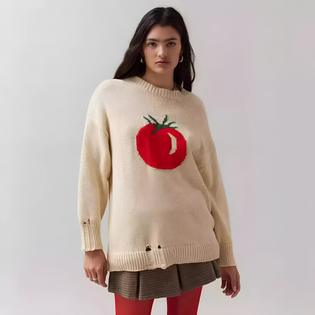 Milky white women's jacquard knit pullover sweater with a round neck and long sleeves on a hanger.