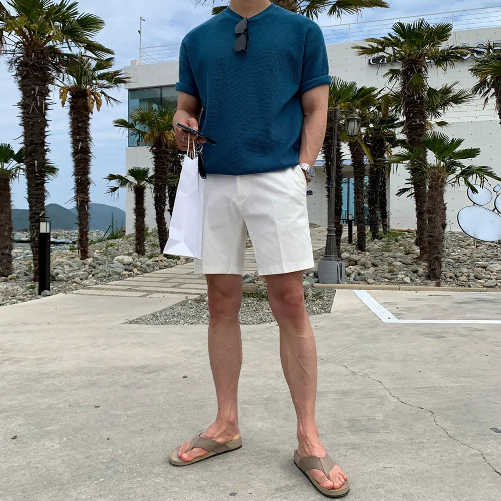 Men's straight-leg casual shorts in polyester fabric available in black, white and khaki colours