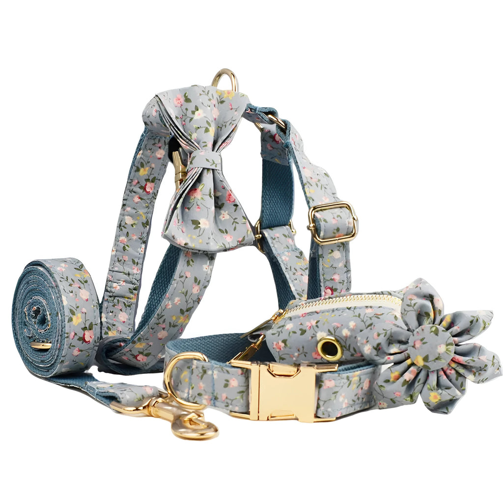 Blue floral pattern dog collar set with matching leash, vest, bow and accessories for small dogs