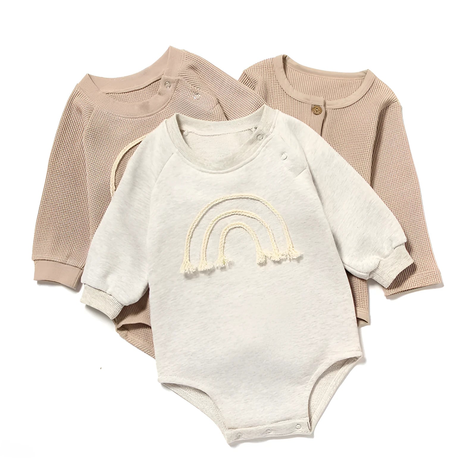 Long sleeve waffle cotton baby romper in neutral colour on hanger