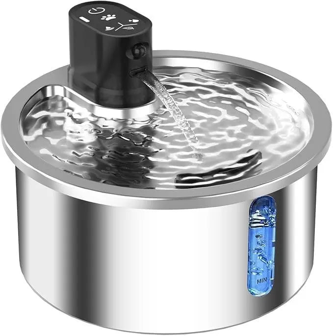 White stainless steel heated pet water fountain for cats and dogs on a countertop.