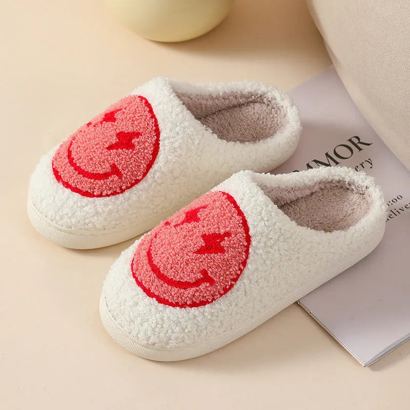 Womens plush cartoon slippers with a round toe and non-slip PVC sole in various colour designs.