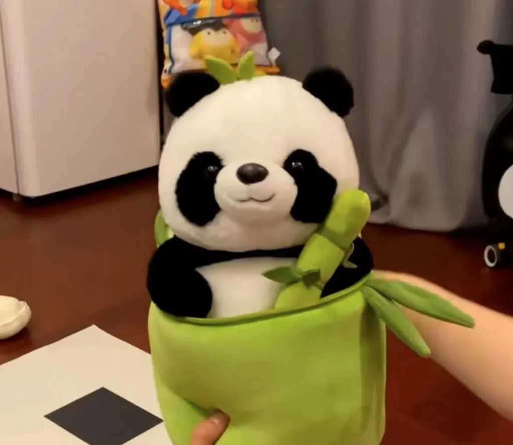 Panda plush doll holding bamboo shoots in bamboo tube design with PP cotton filling