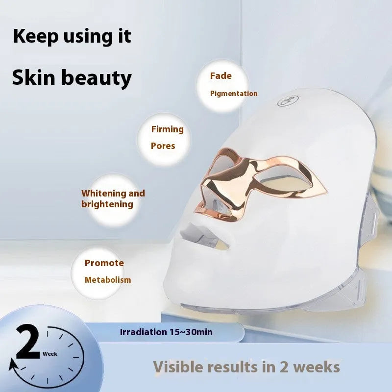 Rechargeable manual touch LED beauty mask in white gold rim, rose gold rim, or black gold rim finish.