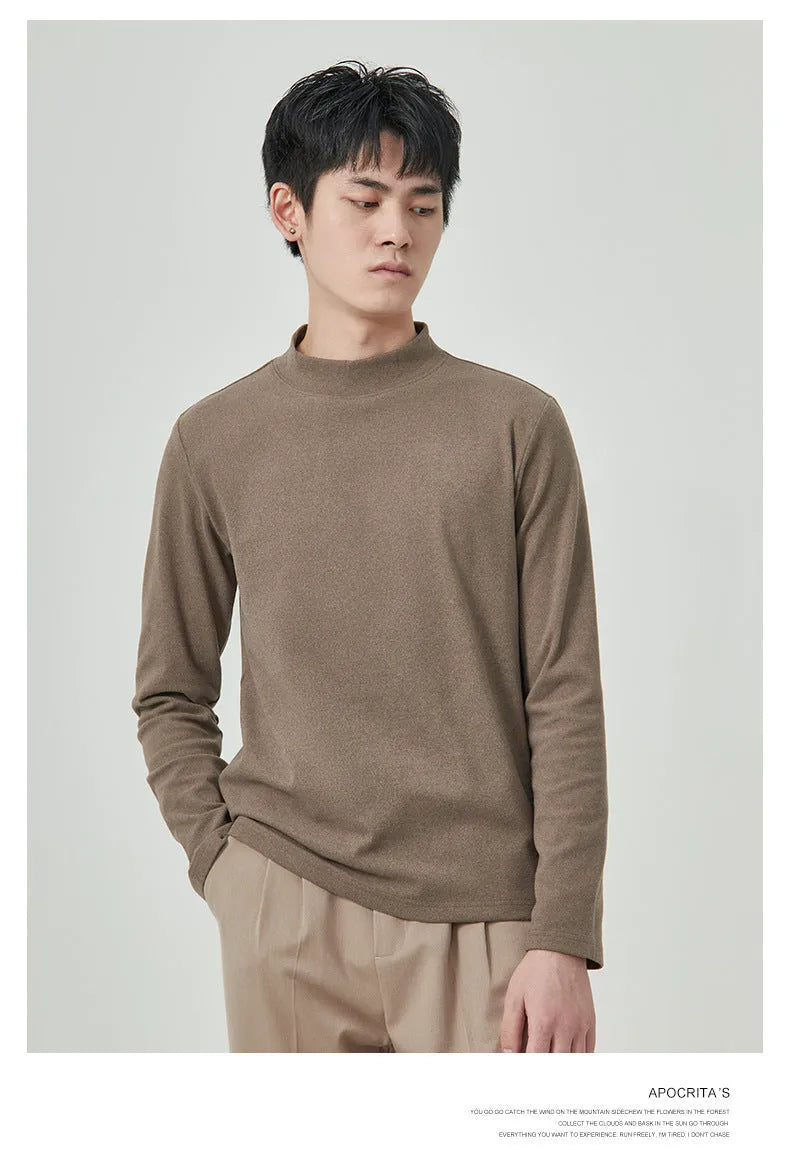 Men's solid colour half-high collar long sleeve t-shirt in Dralon fabric on a hanger.