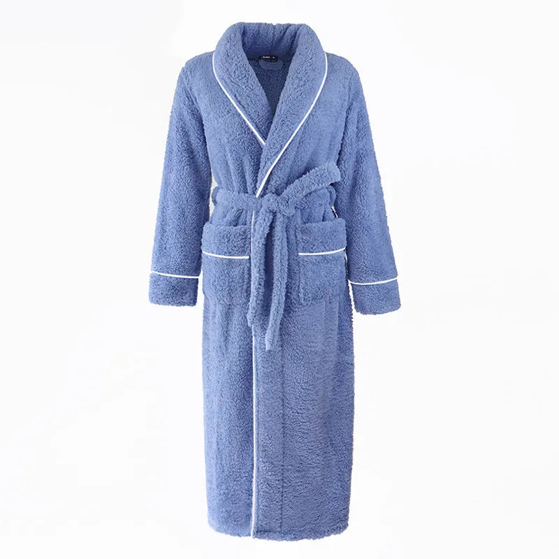 Man and woman wearing matching thick flannel bathrobes in winter colours like navy blue and cherry yellow.