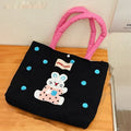 Cartoon kitten print canvas handbag measuring 30cm by 36cm by 24cm in blue colour