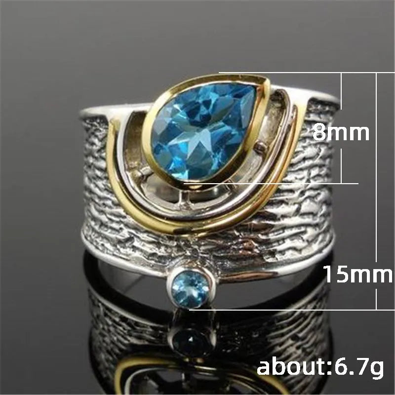 Blue Chinese style zircon ring with drop shape setting on alloy band