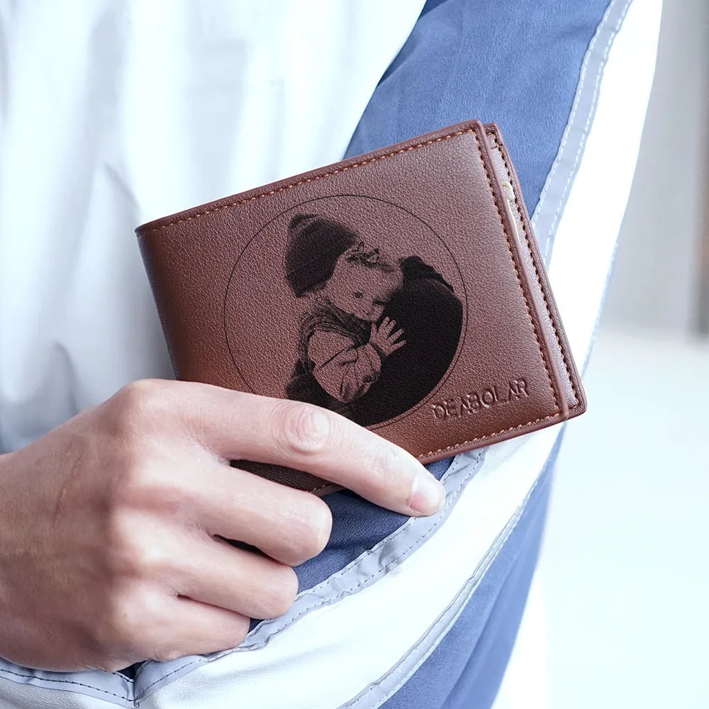 Men's leather wallet with a zipper closure, individually packaged for gift-giving.