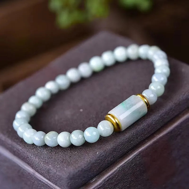 Natural Myanmar jade round beads bracelet in emerald green with ethnic geometric design