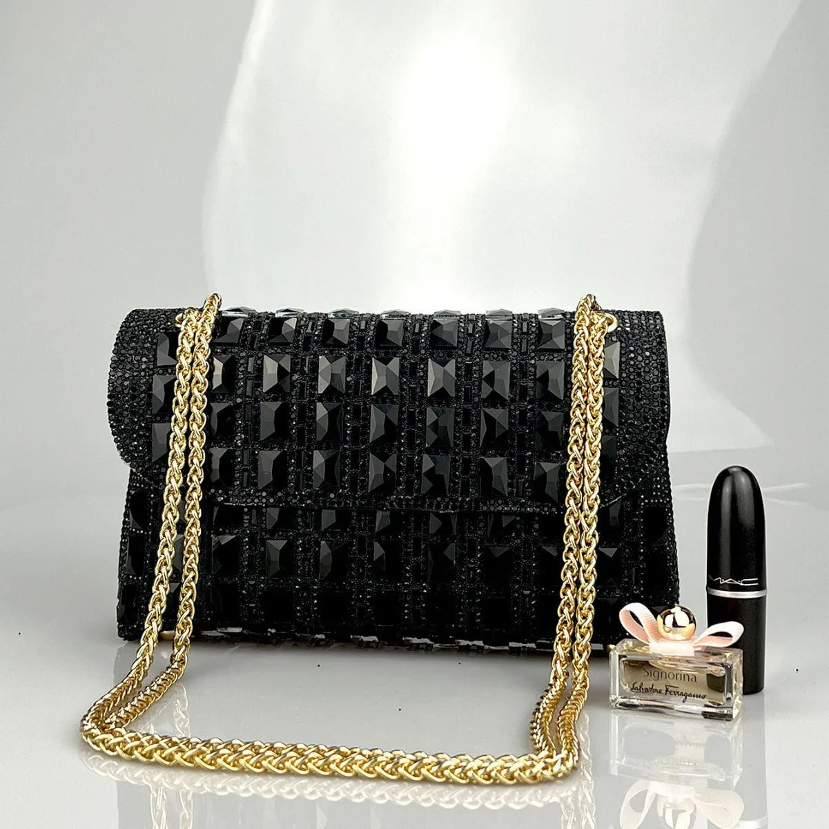 Shiny glass rhinestone chain clutch purse with diamond accents in horizontal square shape