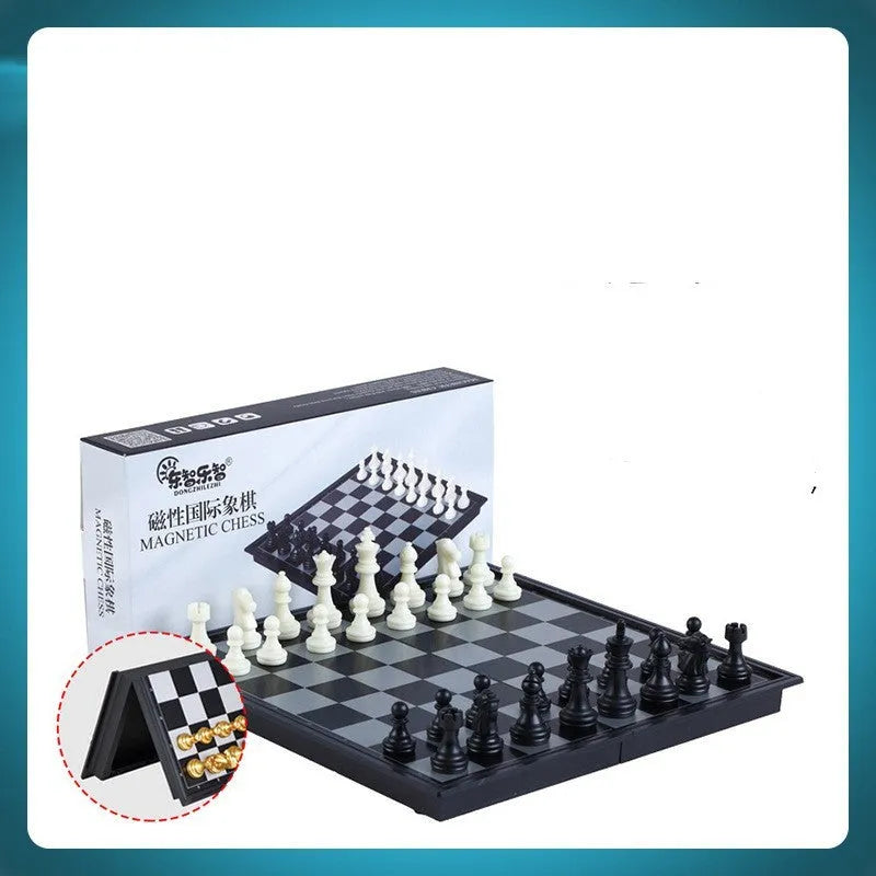 Portable folding ABS chessboard in 32cm size on a table
