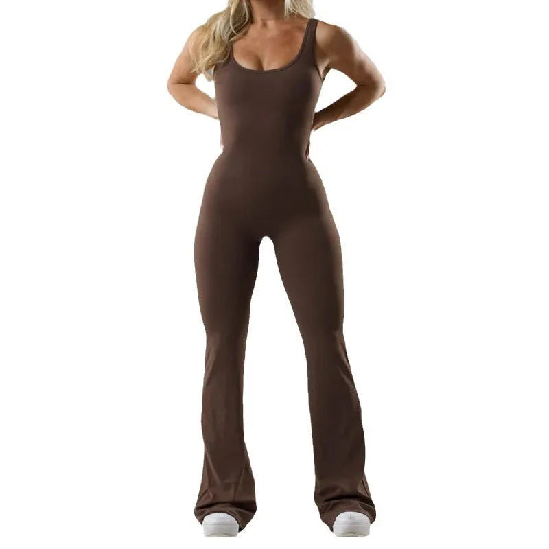 Women's black seamless yoga jumpsuit with built-in chest pad showing mid-waist design