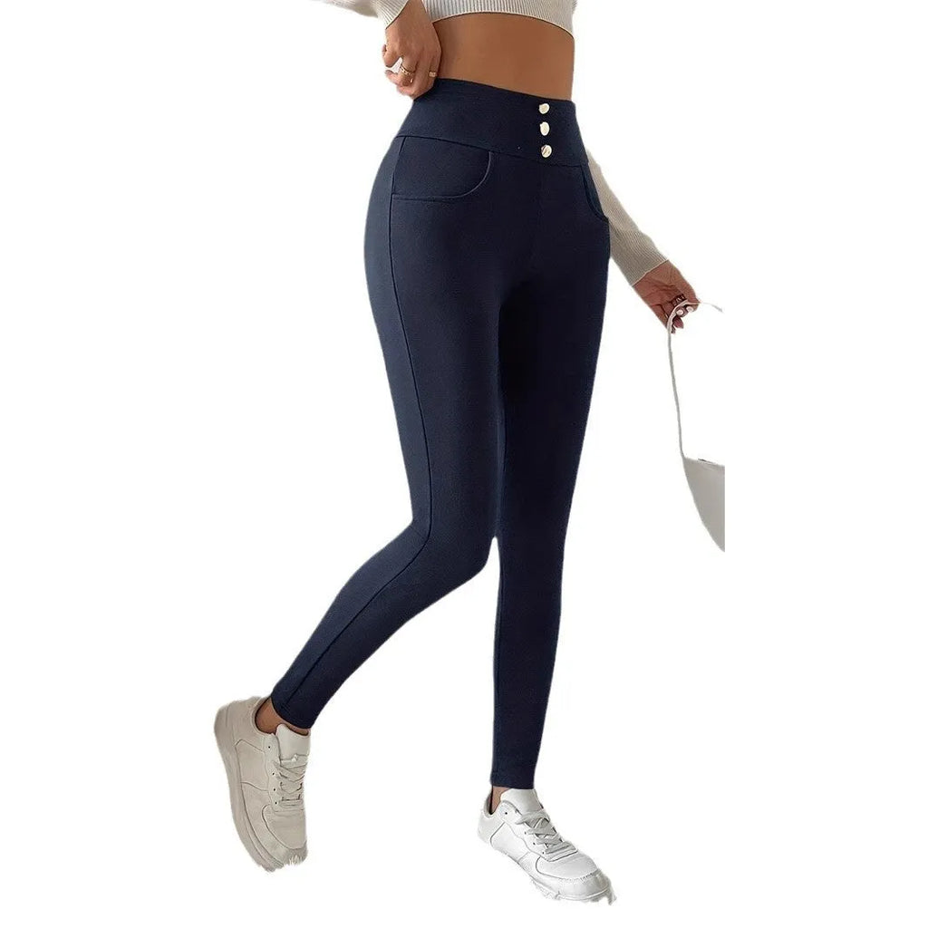 Navy blue high-waist straight leg women's trousers on a hanger.