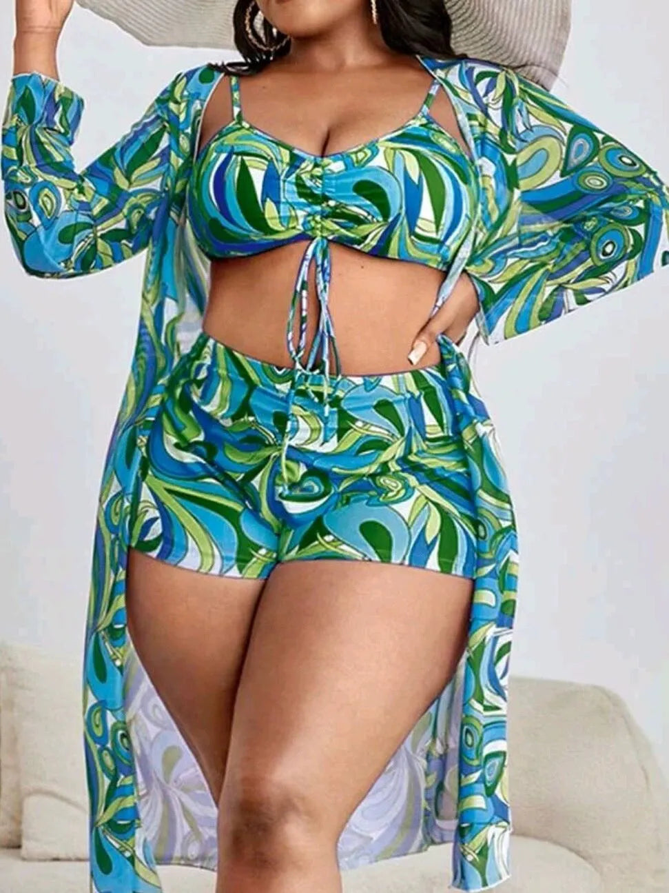 Women's floral print bikini three-piece set with cardigan cover-up in extended sizes