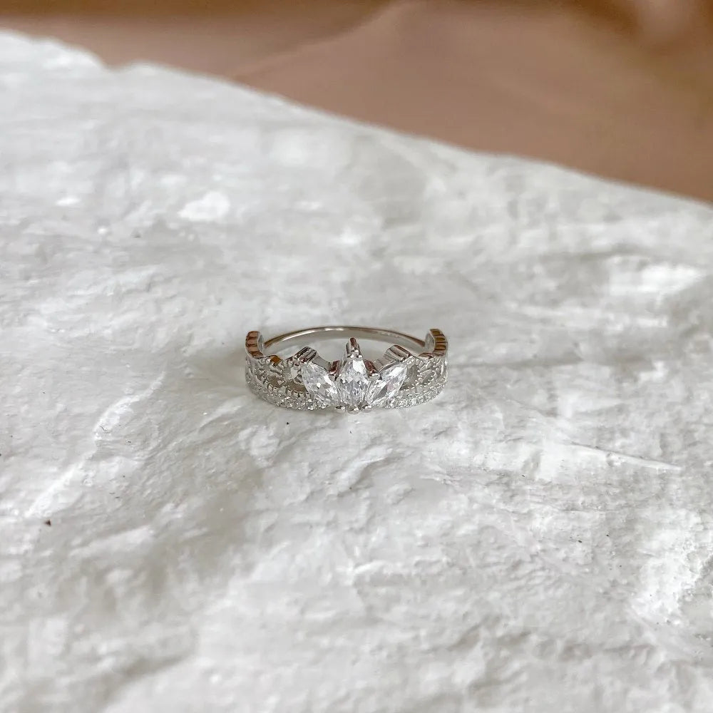 Sterling silver crown-shaped fashion OL women's ring on neutral background