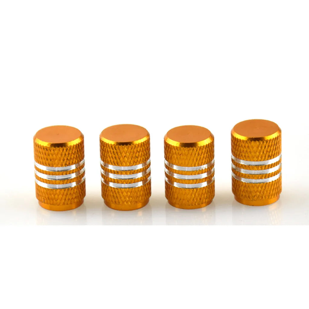 Set of aluminium alloy colour car tyre valve caps in various colours including red, blue, silver, and gold