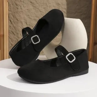 Black canvas women's flat fisherman shoes with low-top design and rubber soles