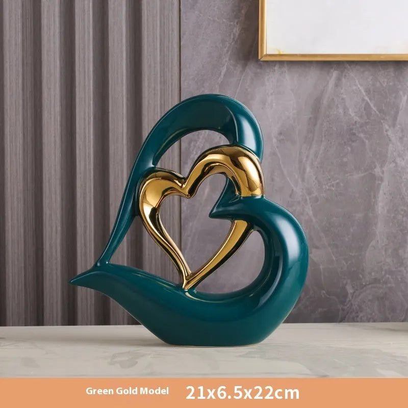 Modern white porcelain heart ornament with a geometric shape on a wooden surface.