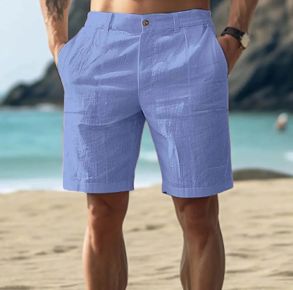 Men's solid colour cotton casual shorts with a mid waist and button fly, shown in dark blue.