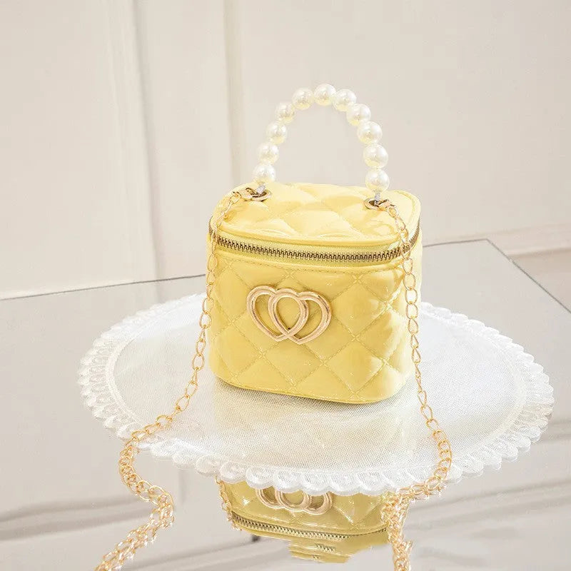 White PVC bucket gel bag with a heart-shaped pattern, shown open.
