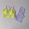 Women's quick drying yoga pants and tank top sportswear set in blue and white colour combination