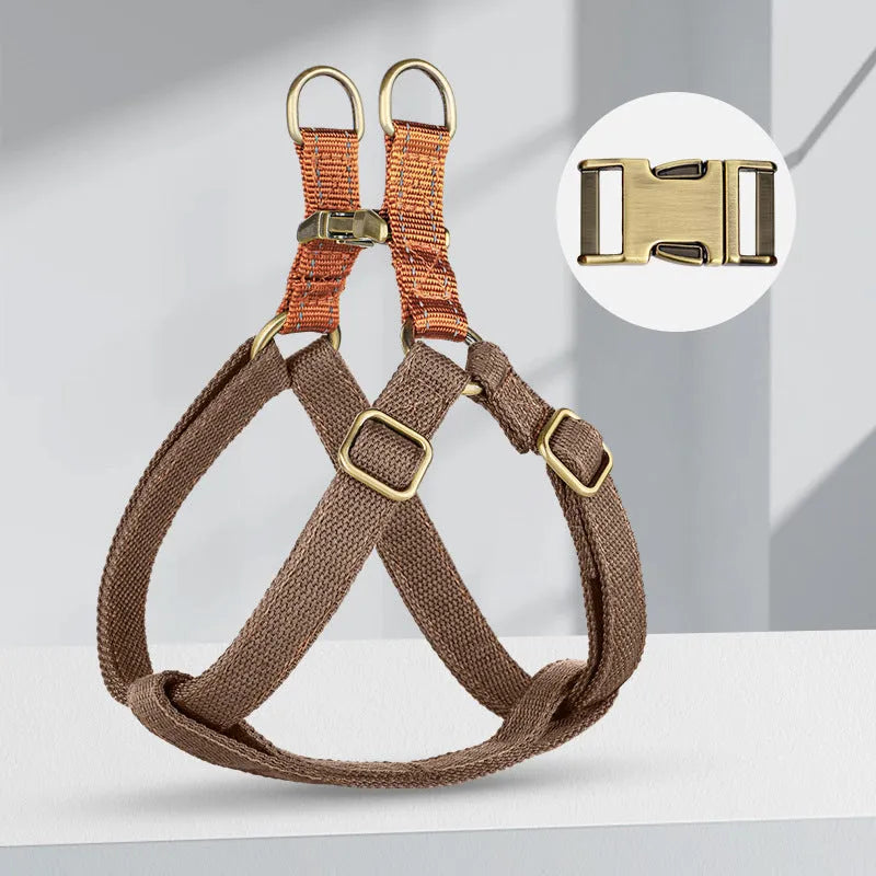 Brown vest style dog leash with nylon harness and cotton handle shown on medium sized dog