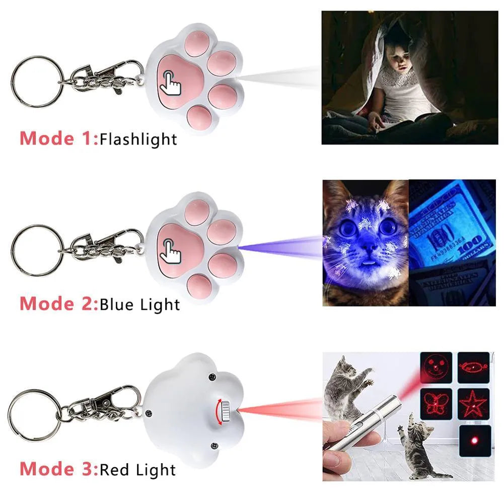 Small black or pink USB-rechargeable infrared cat teaser toy on a keychain, showing scale at 5cm.