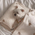 Simple Bear design dog bed set with pillow, mattress and comforter on grey background