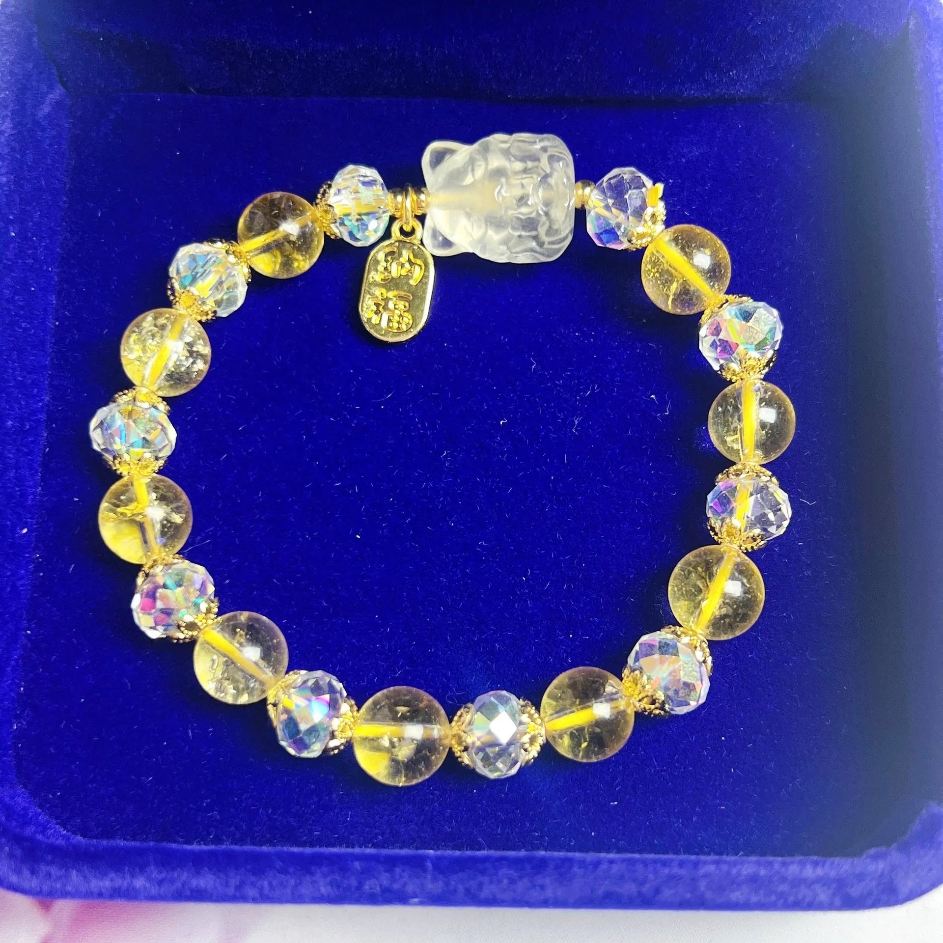 Handmade adjustable bracelet with a natural citrine nine-tail fox charm on a silver-tone chain.
