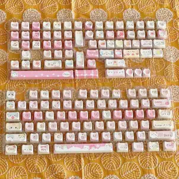 Meow Meow Team Height 141-piece sublimation printed key cap set for mechanical keyboards, showing colourful designs on multiple keys.