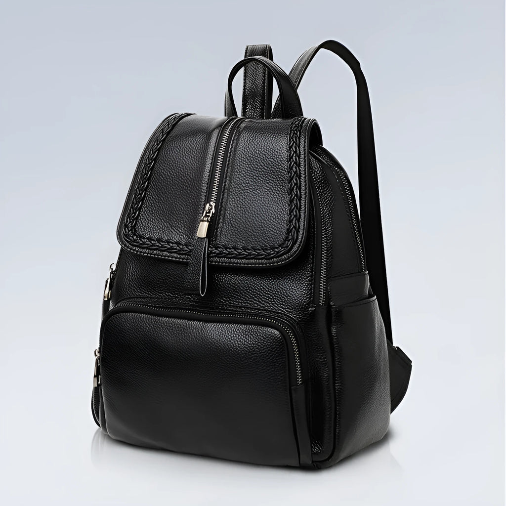 Solid colour genuine leather women's backpack showing blue and wine red options with internal compartments.