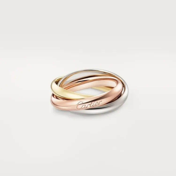 A set of two silver U-shaped geometric couple's rings, one with full diamonds and one plain, on a jewellery display.