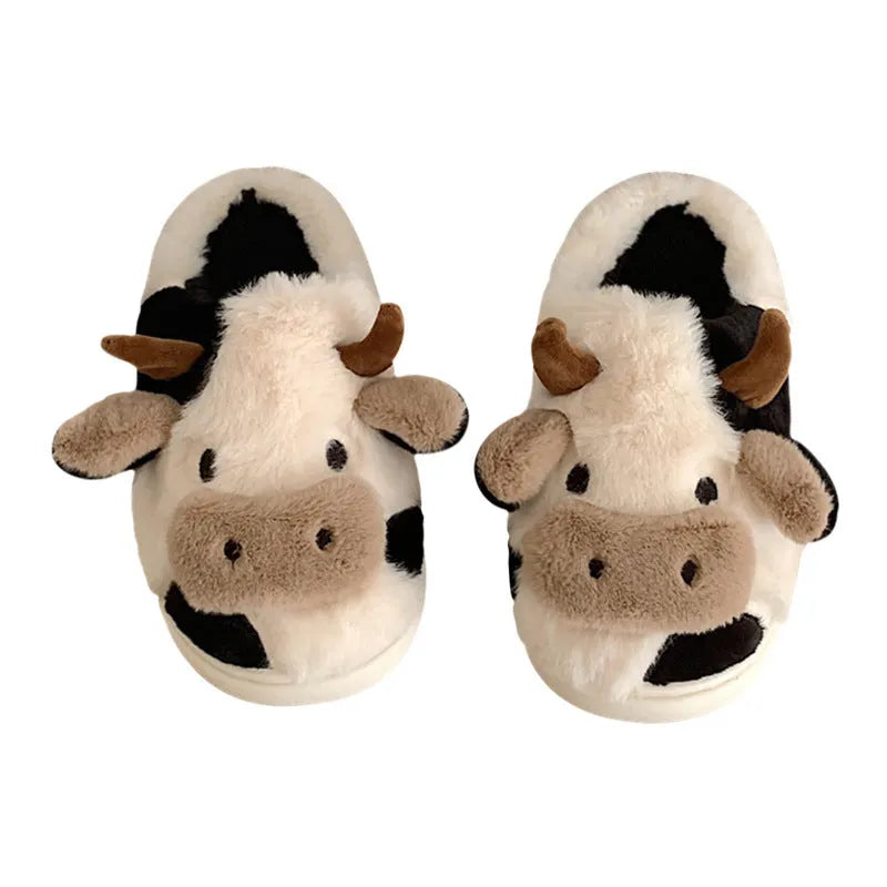 White cartoon cow slippers for women with soft faux fur and textured anti-slip soles