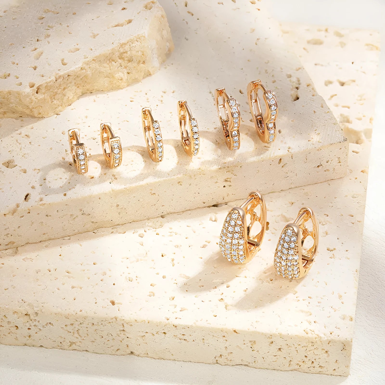 Brass gold plated heart-shaped clip earrings with gang drill zircon detail on copper base