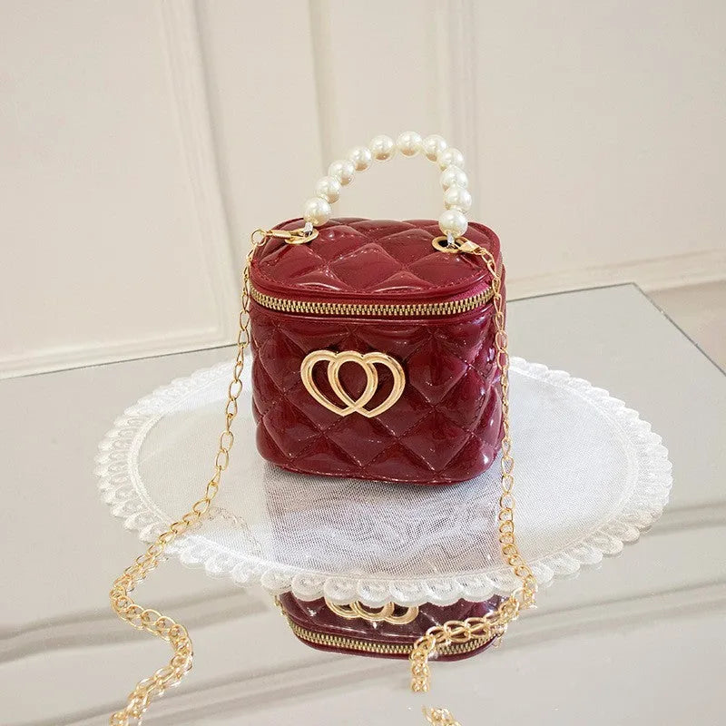 White PVC bucket gel bag with a heart-shaped pattern, shown open.