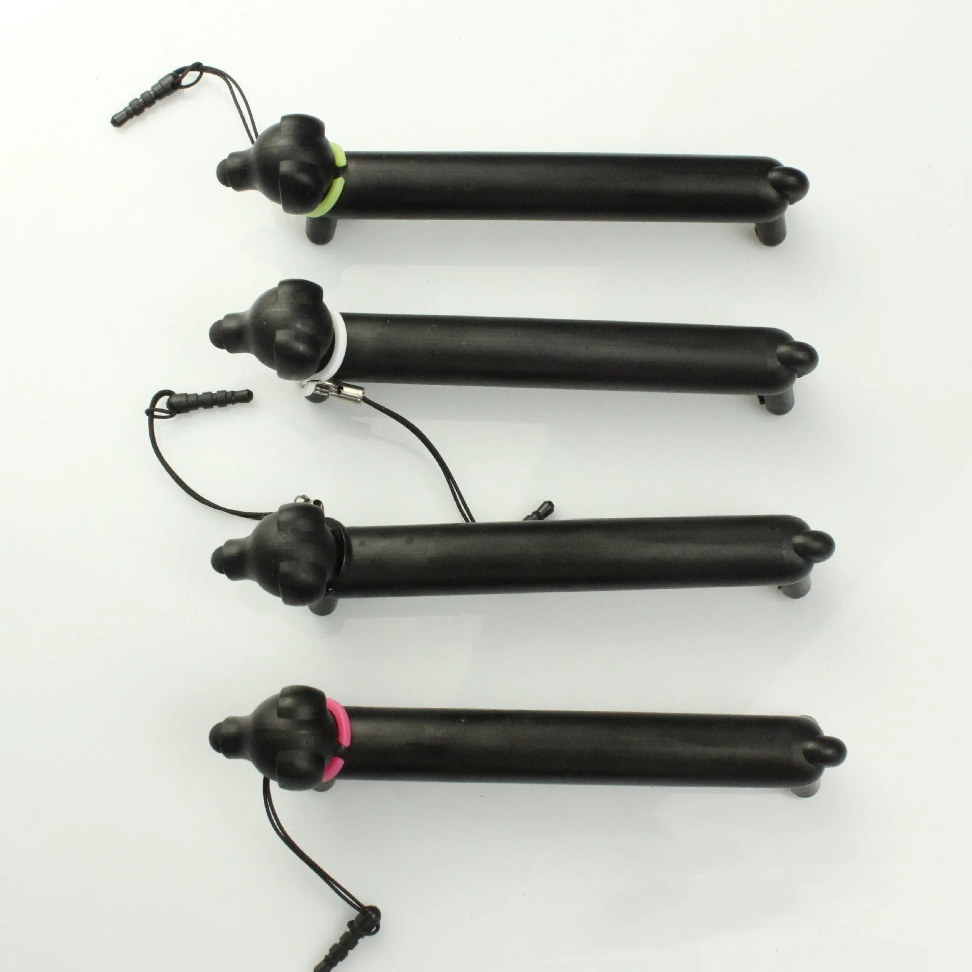 Black dog-shaped touch screen stylus with adjustable length and phone holder stand base