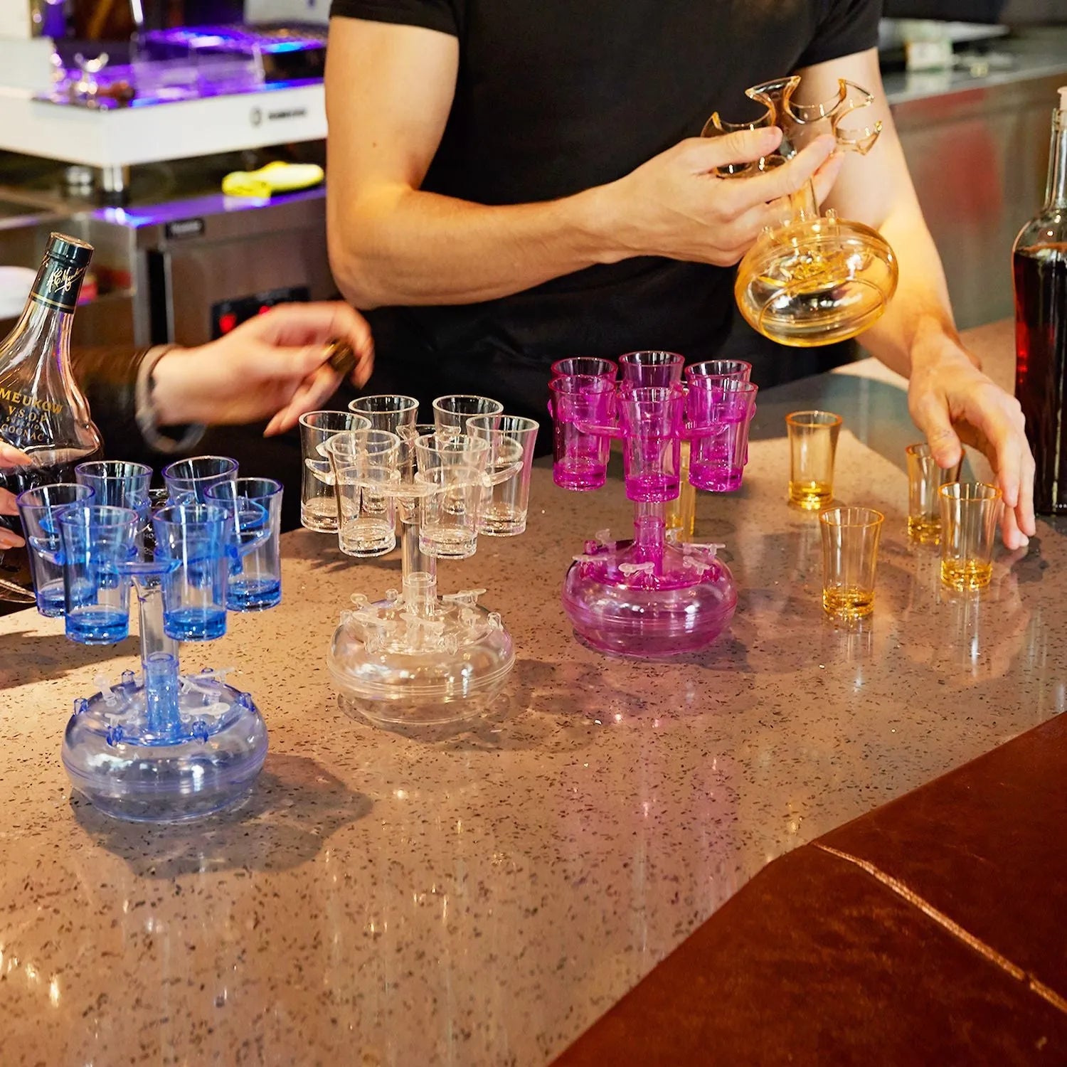 Clear PMMA 6-shot glass dispenser rack holding six shot glasses, a bar accessory for parties.